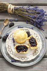 Muffins filled with blueberry and blackberry jam
