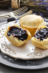 Muffins filled with blueberry and blackberry jam