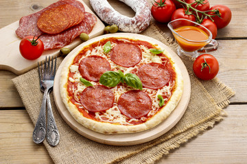 Italian cuisine: pizza with salami
