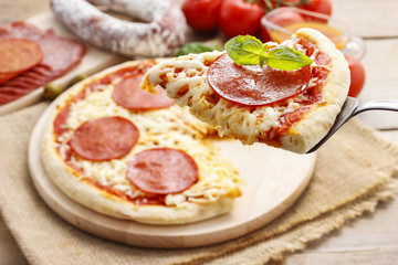 Italian cuisine: pizza with salami