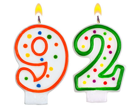 Birthday candles number ninety two isolated on white background