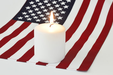 American flag and a candle.