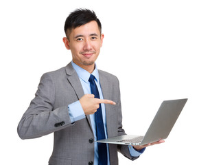 Asian businessman finger point to laptop computer