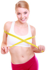 Fitness woman fit girl with measure tape measuring her bust