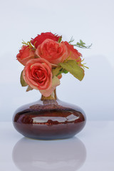 bouquet of flowers in vase isolated on white background