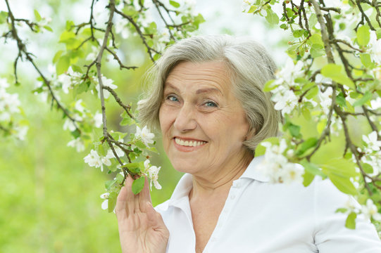 Pensive elderly woman