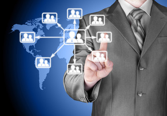 Obraz premium Businessman pressing modern social buttons