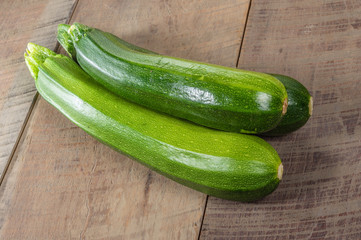 Zucchini squash on wooden table