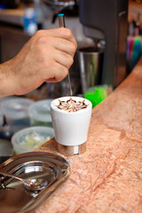 Fototapeta na wymiar Cappuccino preparation