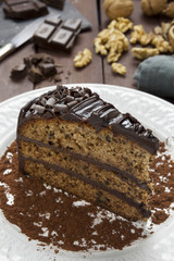 Slice of chocolate banana and walnut cake