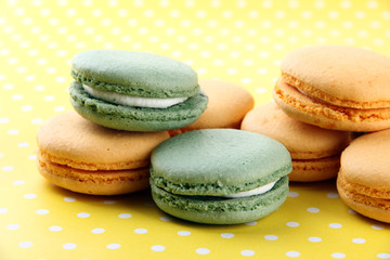 Gentle macaroons on table close-up