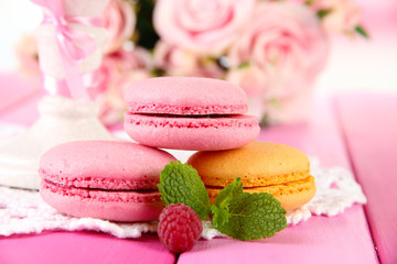 Gentle macaroons on table close-up