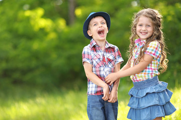 Portrait of a boy and girl in summer