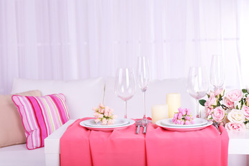 Festive table setting in interior
