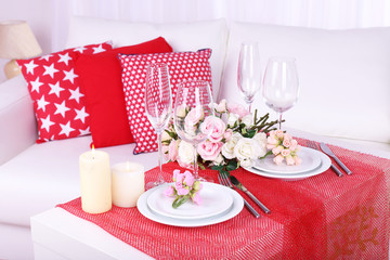 Festive table setting in interior