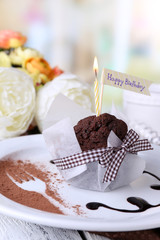 Chocolate muffin with chocolate sauce