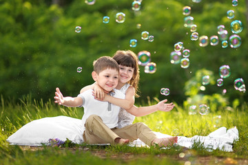 Portrait of a boy and girl in summer