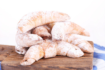 Tasty bagels with sugar powder