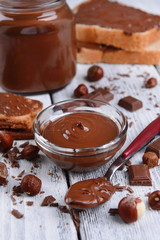 Sweet chocolate cream in bowl on table close-up