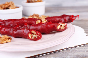 Tasty oriental sweets (churchkhela) and fresh nuts,