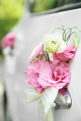 Wedding car decorated with flowers