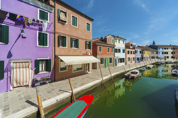 Canal in Burano island, Venice, Italy.