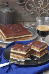 Chocolate coffee cake Opera, selective focus