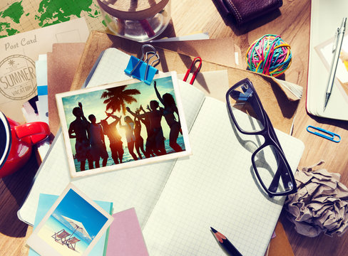 Desk with Summer Photographs and Notebook