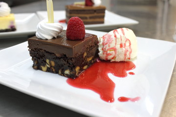 brownie cake with raspberry sauce