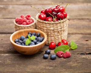Fresh berries on a wooden table