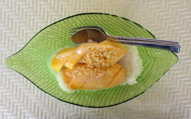 Glutinous rice eaten with mango.