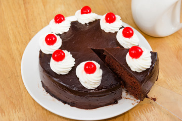 chocolate cake with red Jelly on top