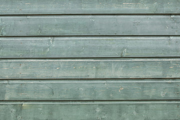 Obraz premium background consisting of weathered green grey boards