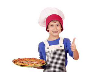 happy boy chef with thumb up and pizza