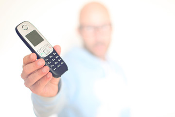 Mann mit Schnurlosem Telefon