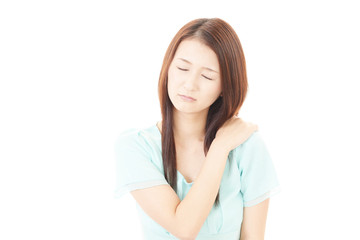 肩痛を訴える女性