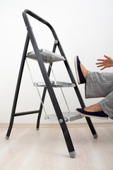 A housewife falling from a ladder