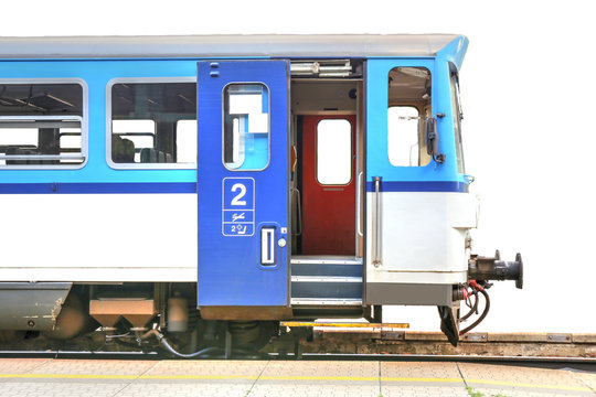 blue train with open door, isolated