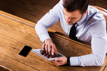 Working at the bar counter.