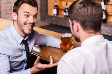 Sharing beer with good friend.