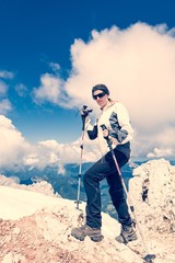 Young woman ascending a mountain