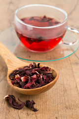 Hibiscus tea on wooden surface