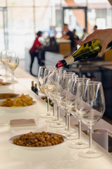 Waiter hand serving wine