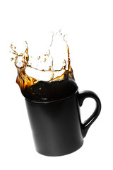 splashing coffee in a cup - 67514856