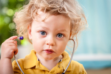 Portrait of a cute little boy with stethoscope