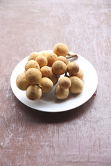 Fresh wollongong fruit in dish.