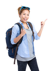 Woman with backpack and finger point up