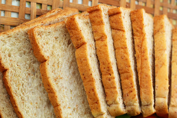 whole wheat bread sliced ​​on a basket