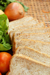 Fresh vegetables salad with whole wheat bread.