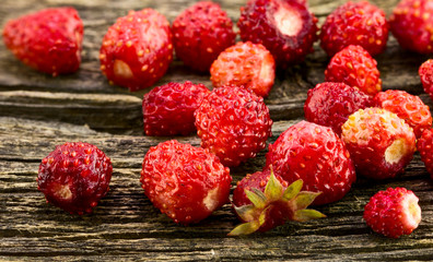 Strawberries on a background of the old board